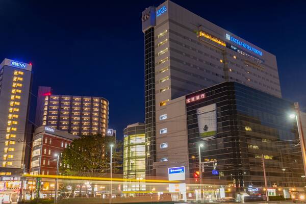 Toyama which includes a city and night scenes