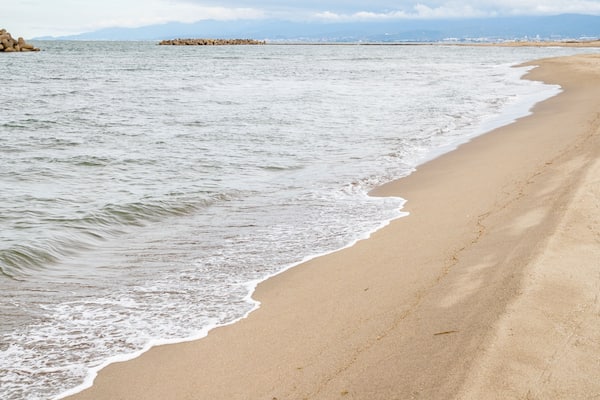 Iwase Beach showing general coastal views and a sandy beach