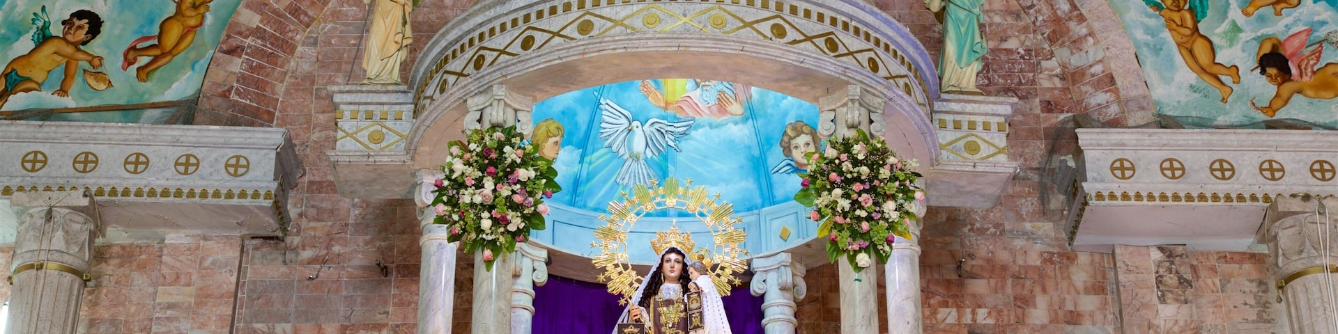 Our Lady of Carmen Church which includes heritage elements, religious aspects and a church or cathedral