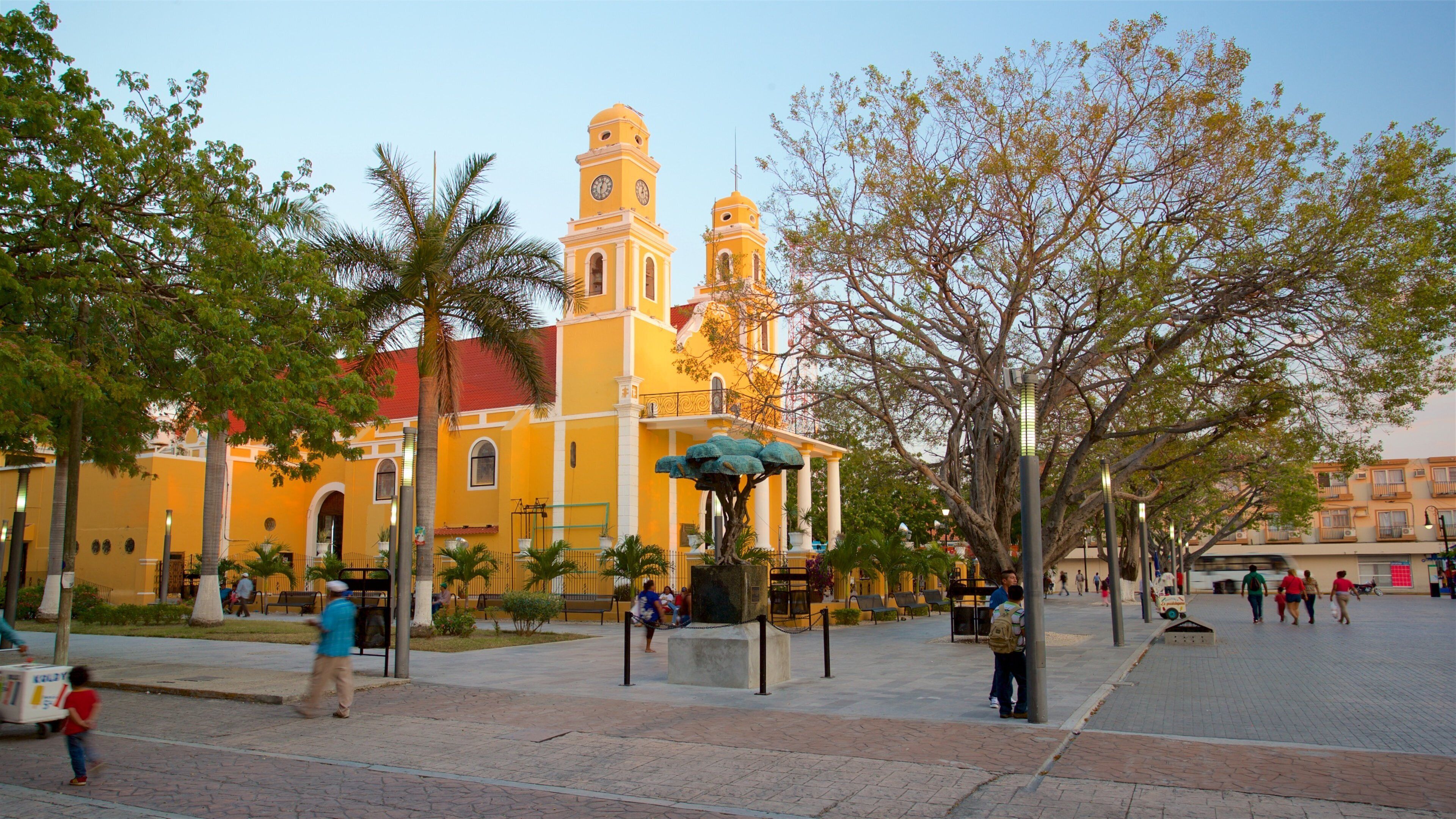 Our Lady of Carmen Church showing a church or cathedral and a sunset
