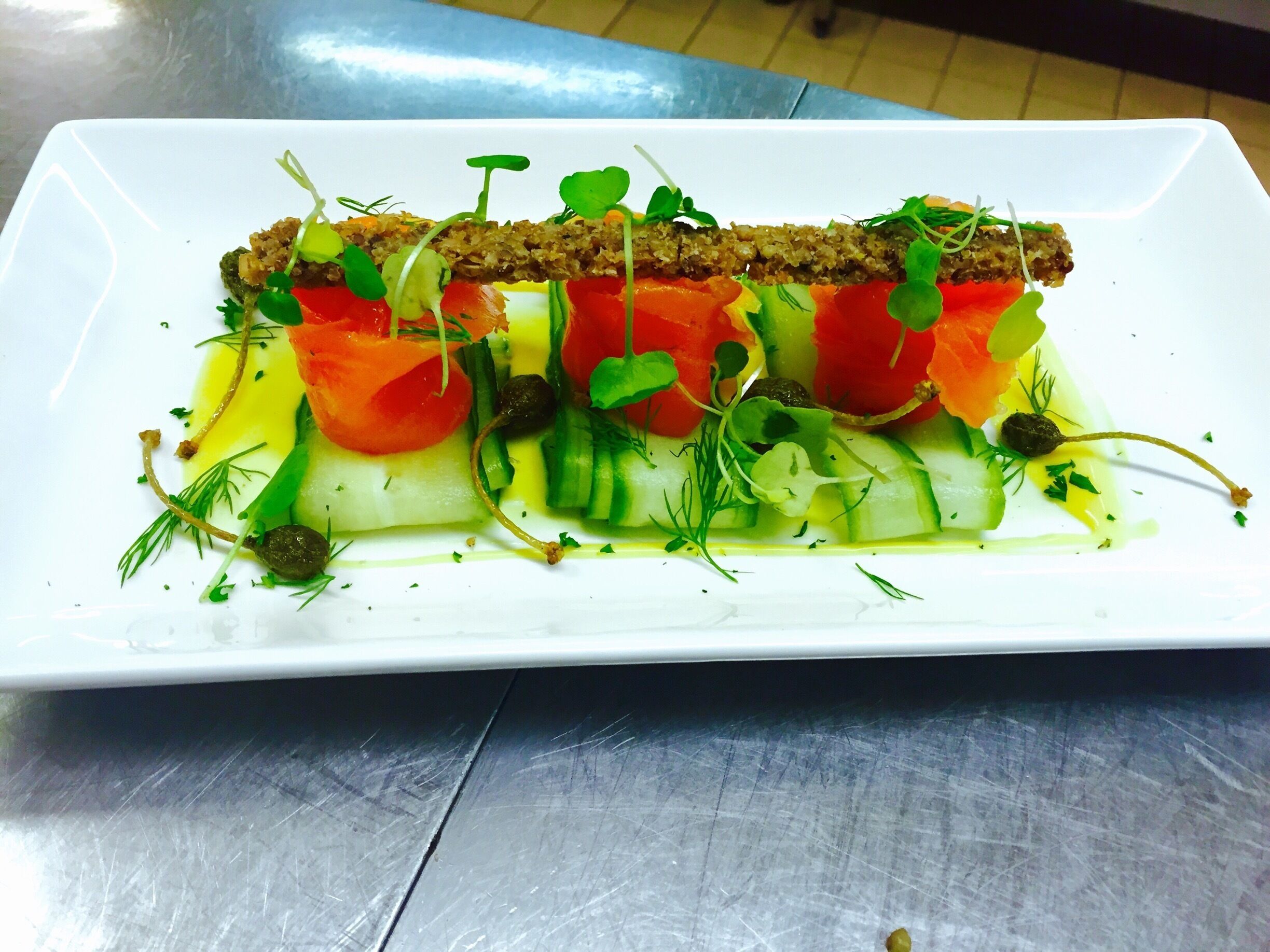 My work 
Smoke salmon and cucumber and dill salad with crispy capers and pumpanickle 