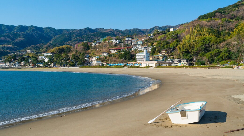 Nagahama Beach which includes a beach, a coastal town and general coastal views