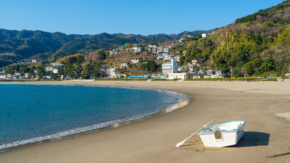 Nagahama Beach which includes a beach, a coastal town and general coastal views