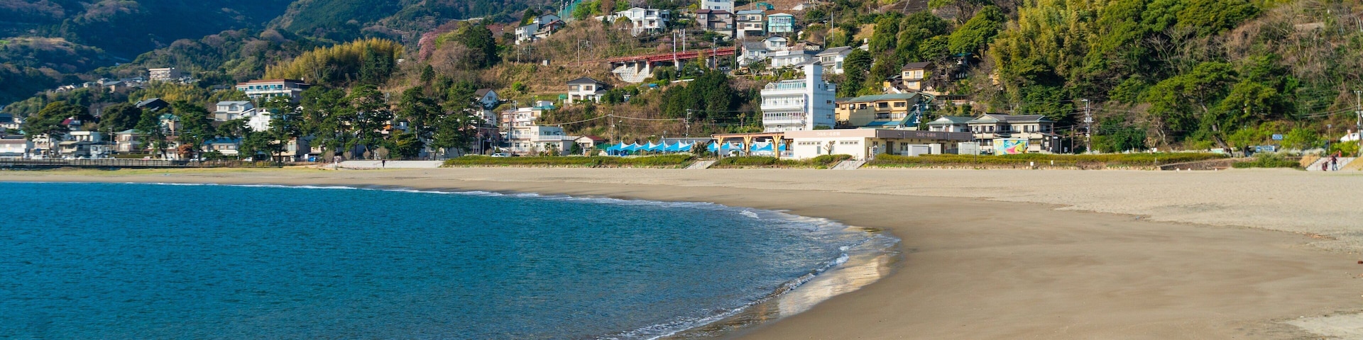 Nagahama Beach which includes a beach, a coastal town and general coastal views