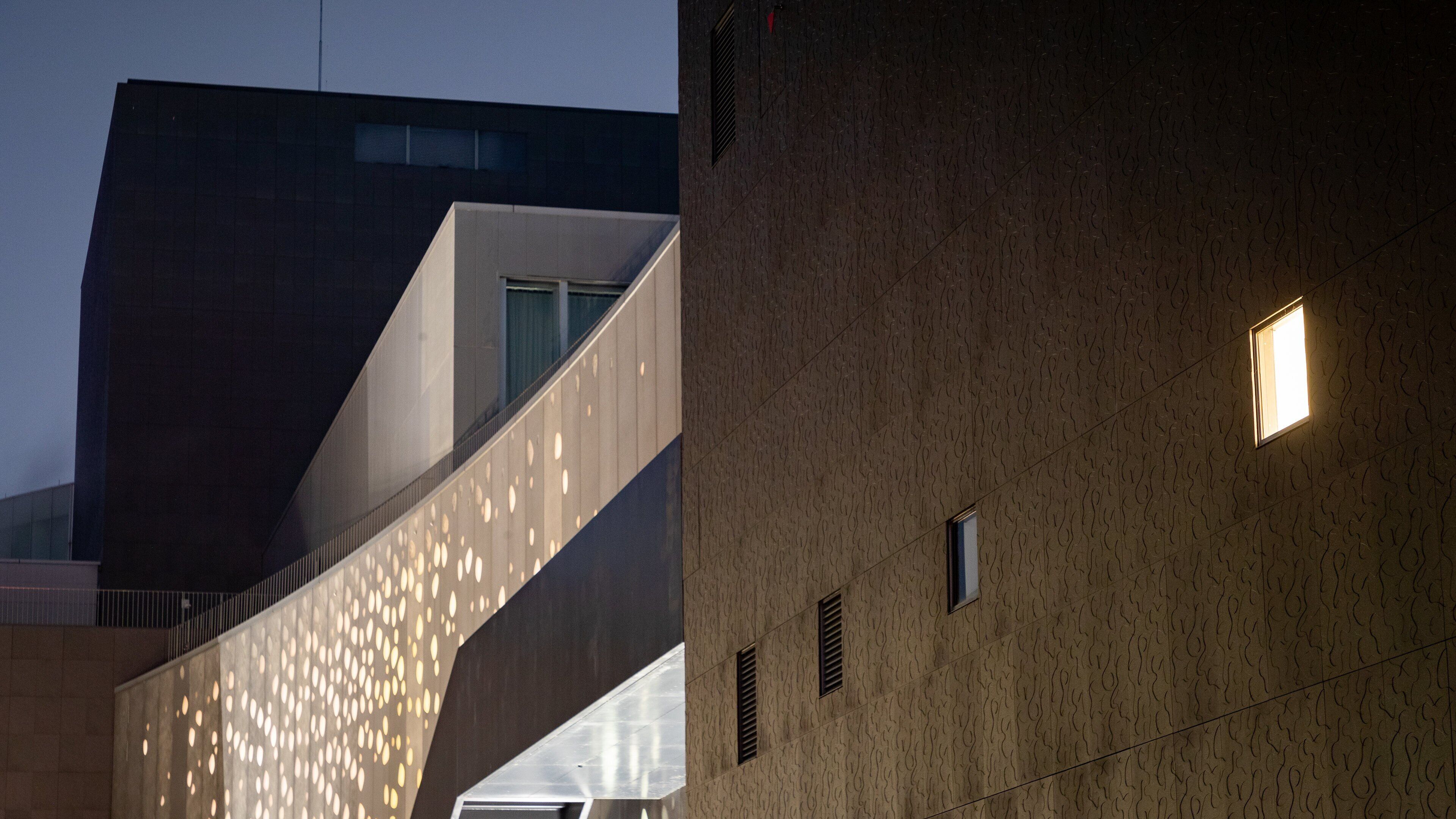 Matsumoto Performing Arts Center featuring night scenes