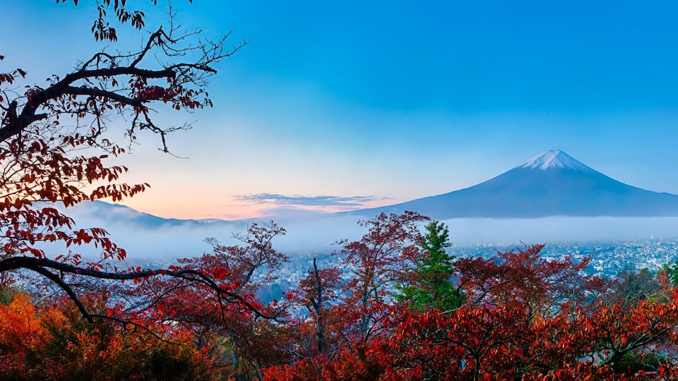 Asian Travel Destinations. Amazing Fuji Mountain With Chureito Pagoda During Fall Season in Fujiyoshida in Japan.