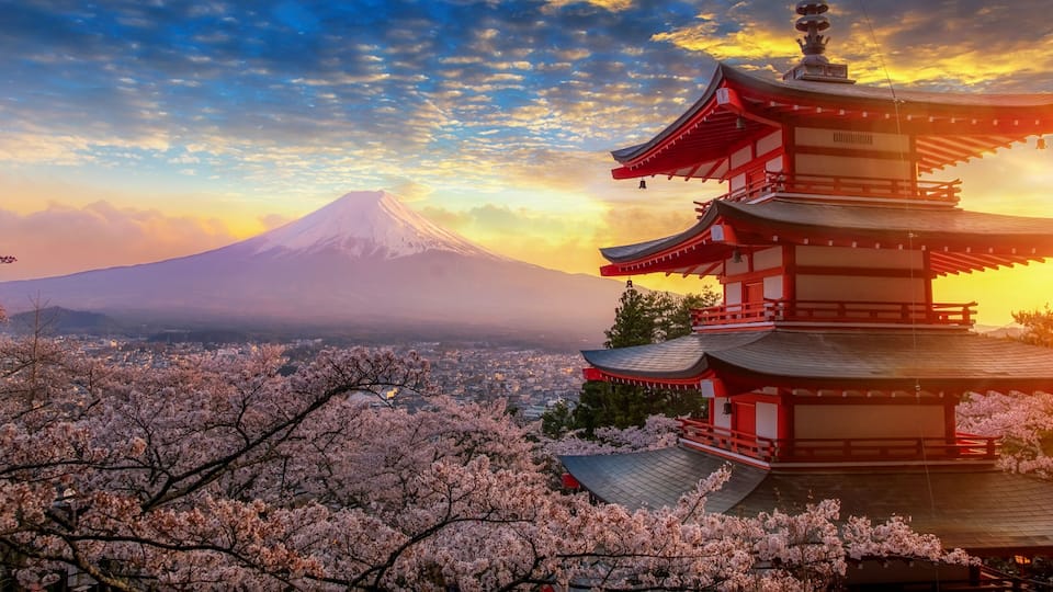 Fujiyoshida, Japan Beautiful view of mountain Fuji and Chureito pagoda at sunset, japan in the spring with cherry blossoms