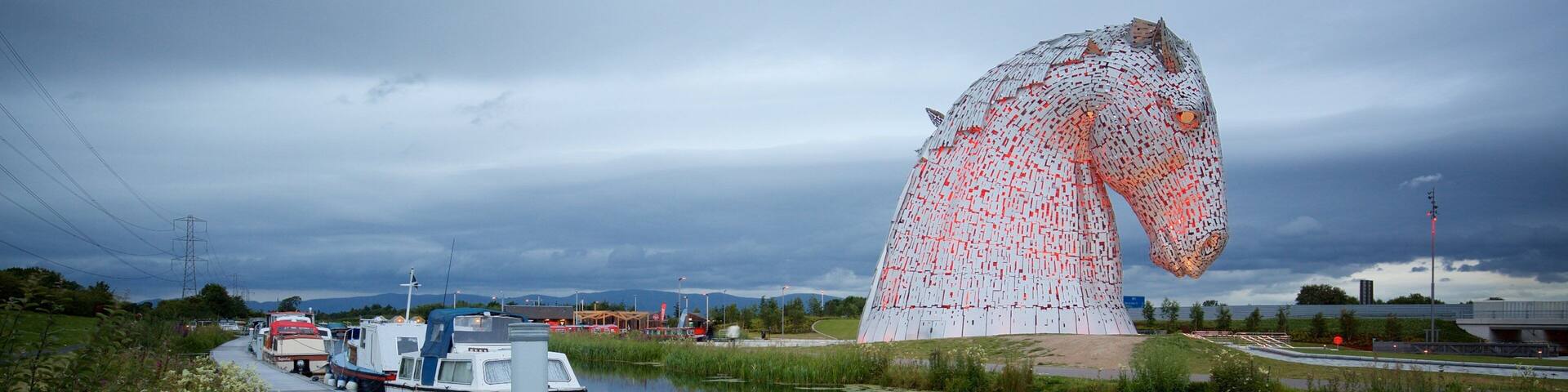The Kelpies featuring night scenes, outdoor art and a river or creek