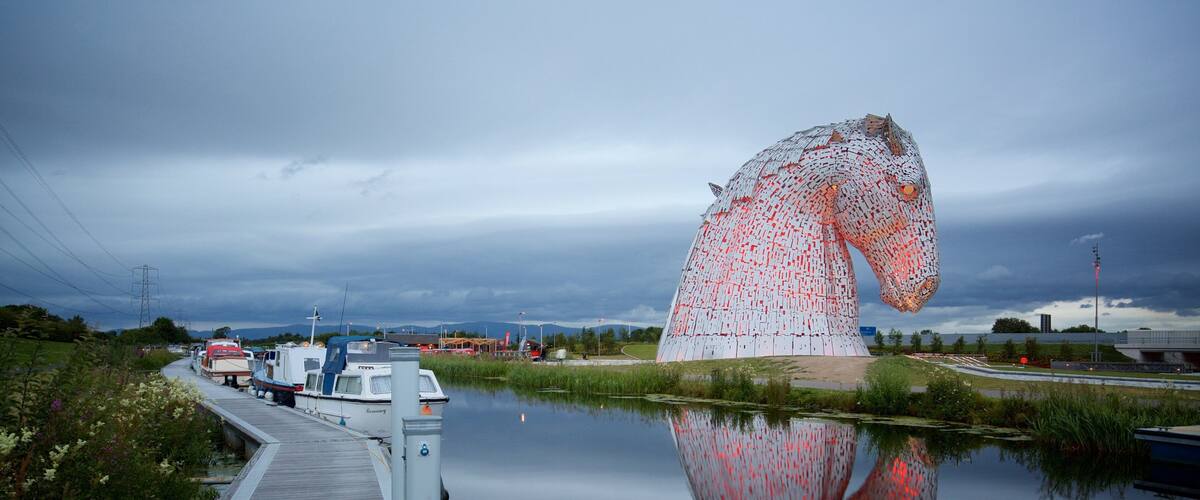 The Kelpies featuring night scenes, outdoor art and a river or creek