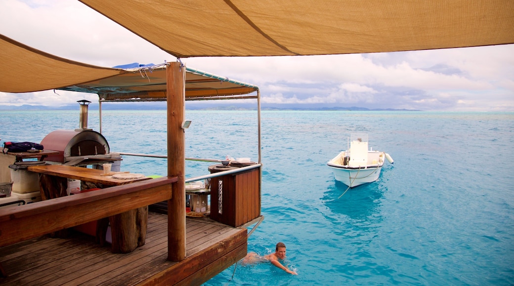Fiji which includes swimming and boating as well as an individual male