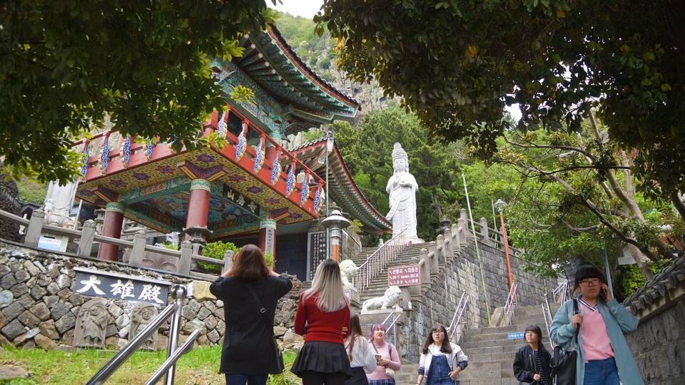 Sanbangsan Mountain which includes heritage elements as well as a small group of people