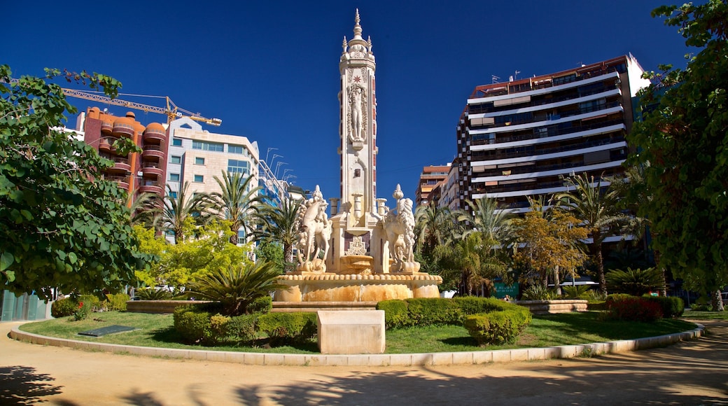 Placa de los Luceros showing a fountain, heritage elements and a garden
