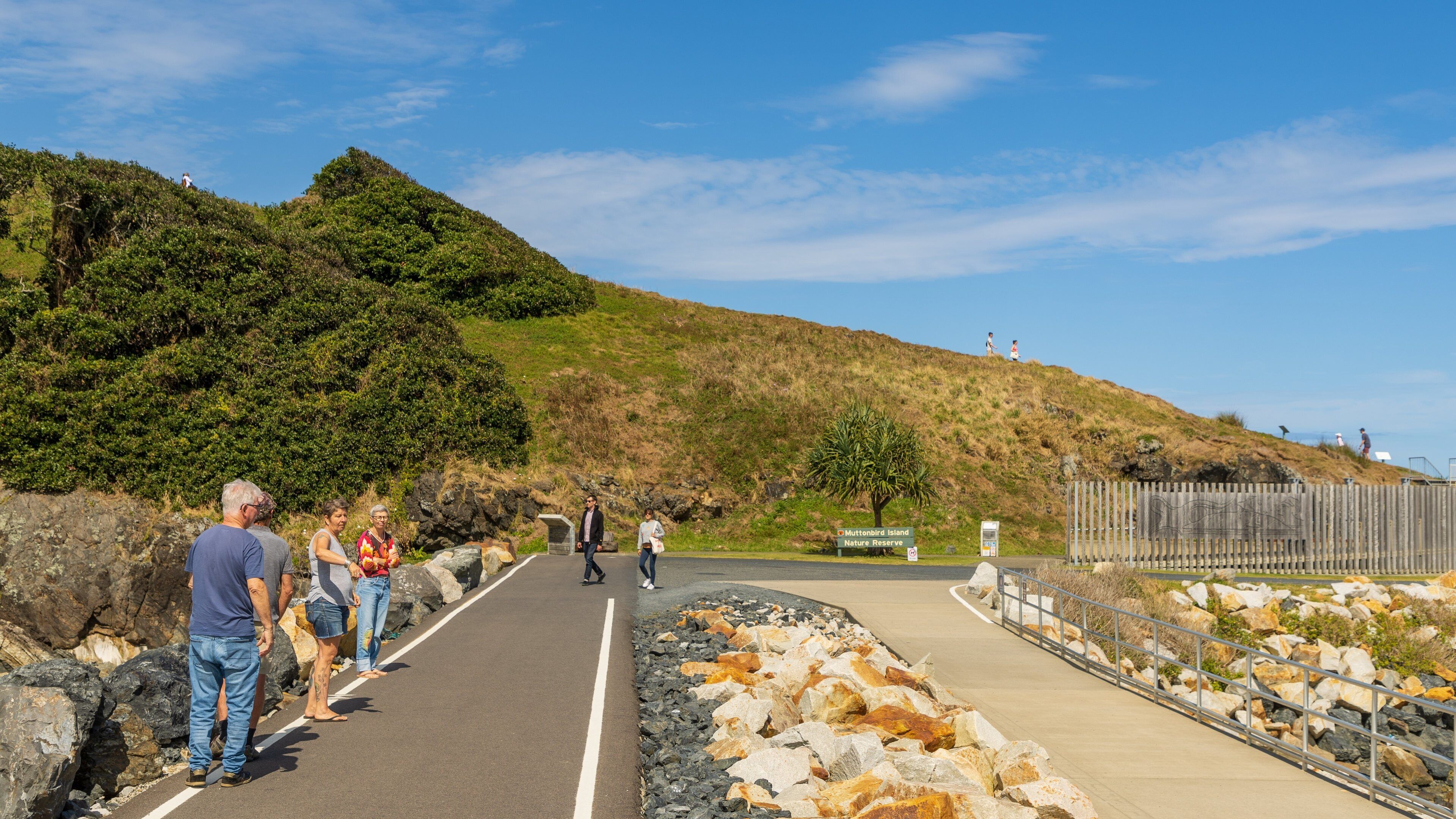 Muttonbird Island Nature Reserve featuring tranquil scenes as well as a small group of people
