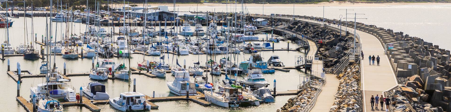Muttonbird Island Nature Reserve featuring a bay or harbor and landscape views
