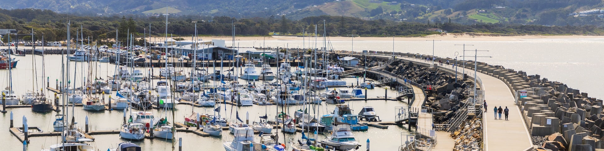 Muttonbird Island Nature Reserve featuring a bay or harbor and landscape views