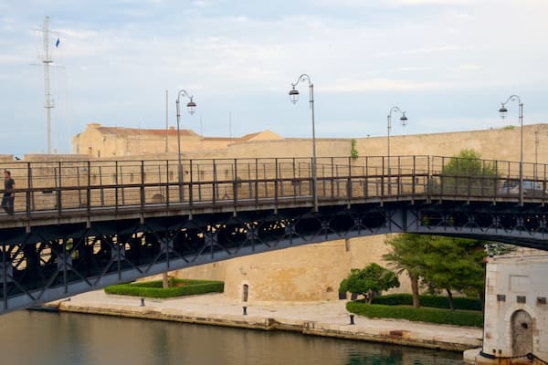 Ponte di Porta Napoli showing a bridge and a river or creek