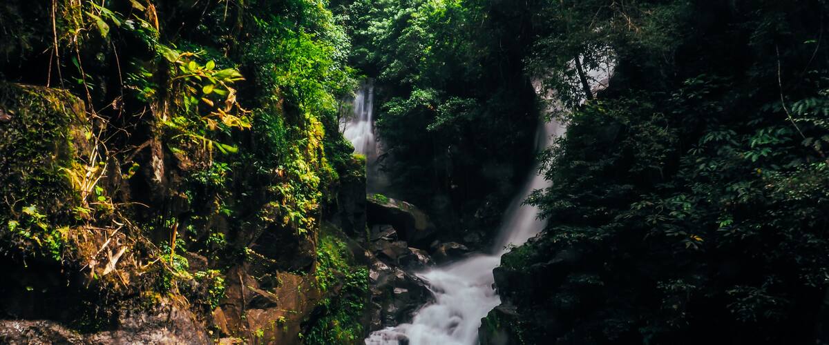 Namtok Phlio, Phlio waterfall with bokeh from water spray on the camera lens at Phlio Waterfall National Park, Chanthaburi, Thailand