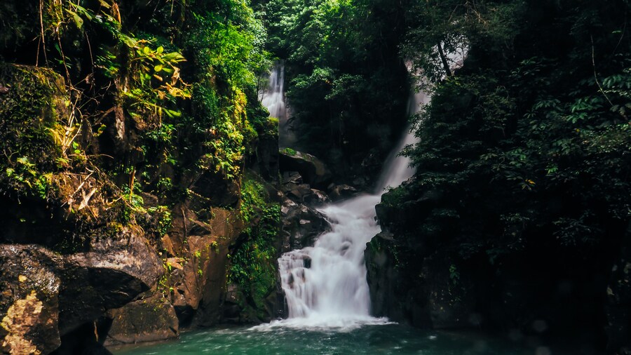 Namtok Phlio, Phlio waterfall with bokeh from water spray on the camera lens at Phlio Waterfall National Park, Chanthaburi, Thailand