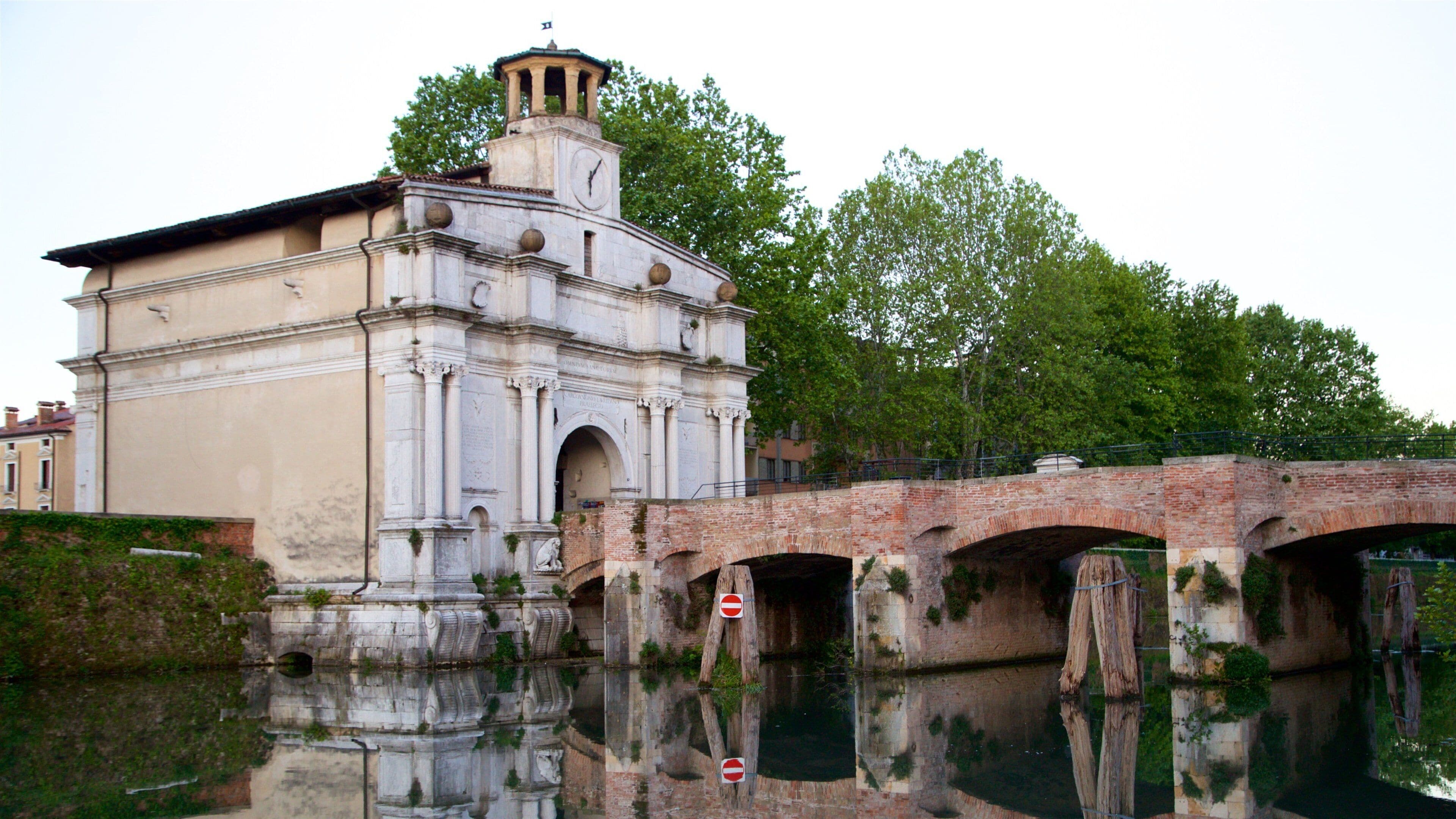 Porta Ognissanti featuring a river or creek, heritage elements and a bridge