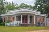 Colonial Revival building of the Emmet Methodist Church with curved portico supported by four columns topped with simple curved capitals, built in 1917 in Emmet, Nevada County, Arkansas, USA