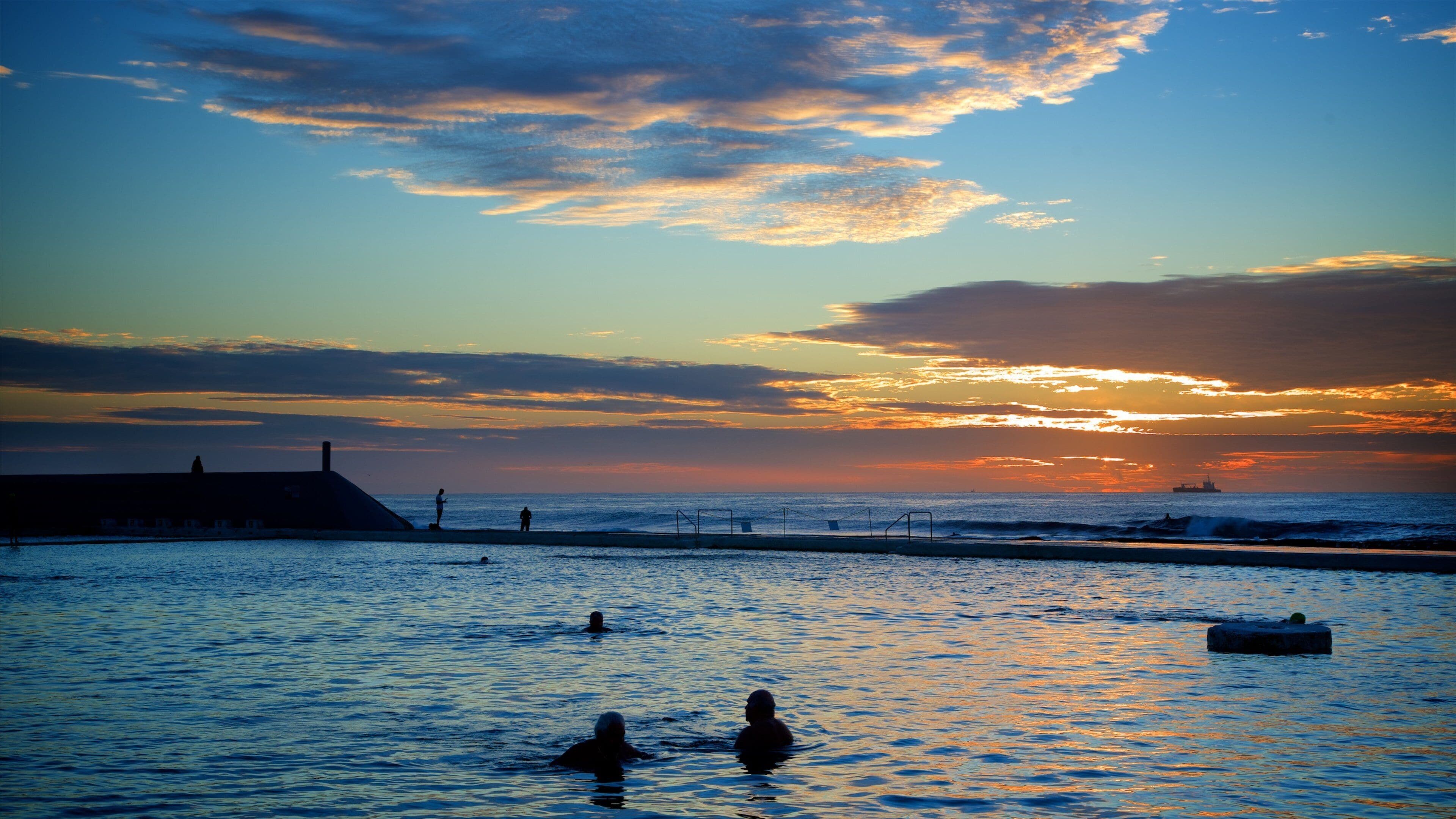 Newcastle which includes a pool and a sunset