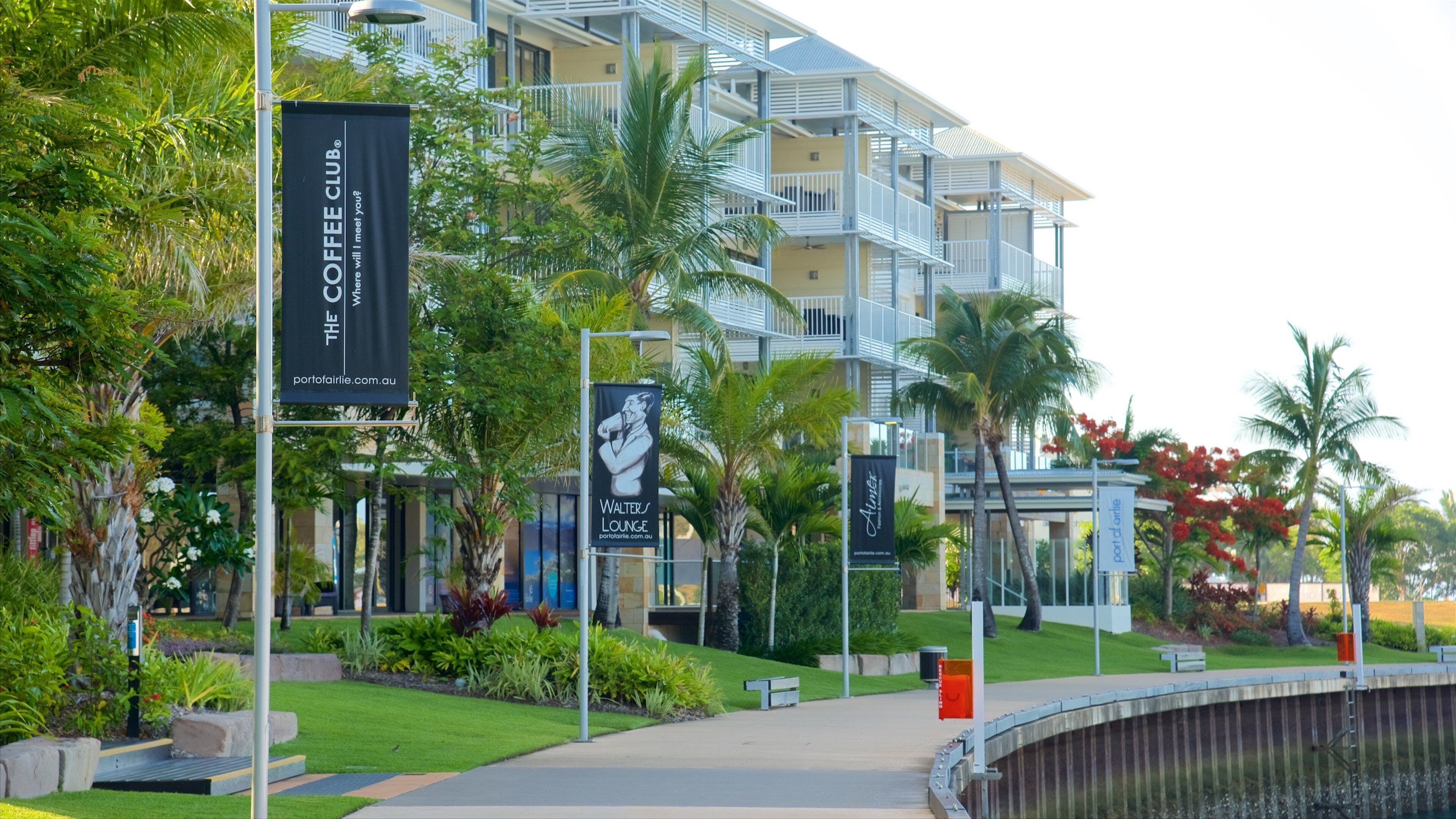Port of Airlie which includes signage and a luxury hotel or resort