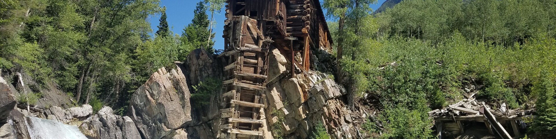 I know, everyone posts a shot of thos place. Nut it really is a photogenic building. 
As for the building, it was a power station where they harnessed the power of the river for pneumatic drills used in the nearby silver mines. It was never a mill.