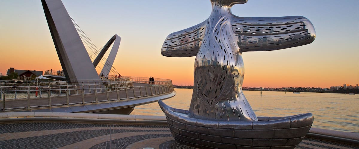 Elizabeth Quay which includes a sunset, outdoor art and general coastal views