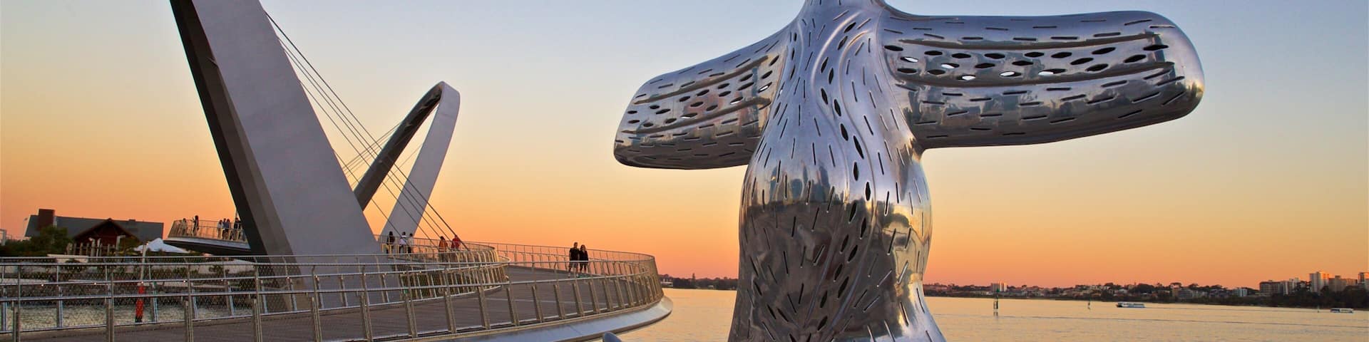 Elizabeth Quay which includes a sunset, outdoor art and general coastal views