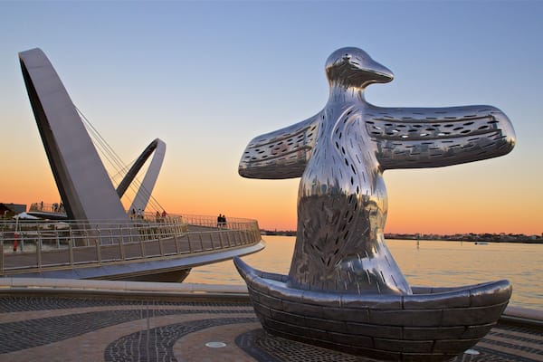 Elizabeth Quay which includes a sunset, outdoor art and general coastal views