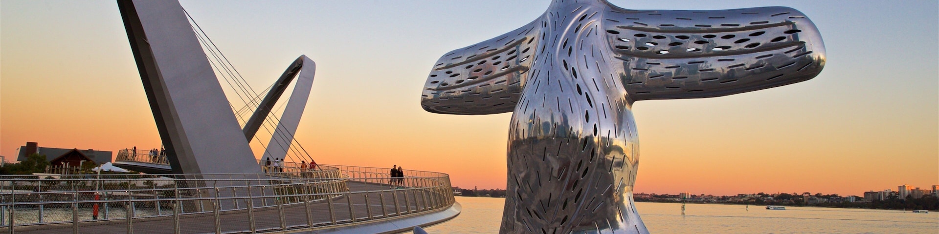 Elizabeth Quay which includes a sunset, outdoor art and general coastal views