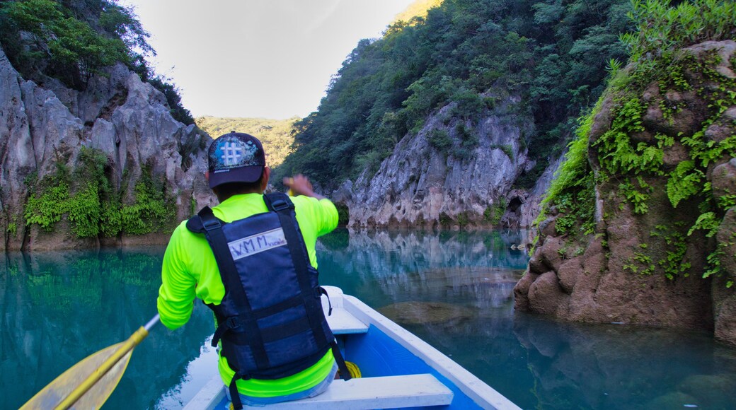 San Luis Potosí Mexico, 06/21/2020: man on his raft in an amazing morning scene at the waterfall (EL SALTO-EL MECO) San Luis Potosi Mexico, colorful sunrise. Beauty of nature concept background.
