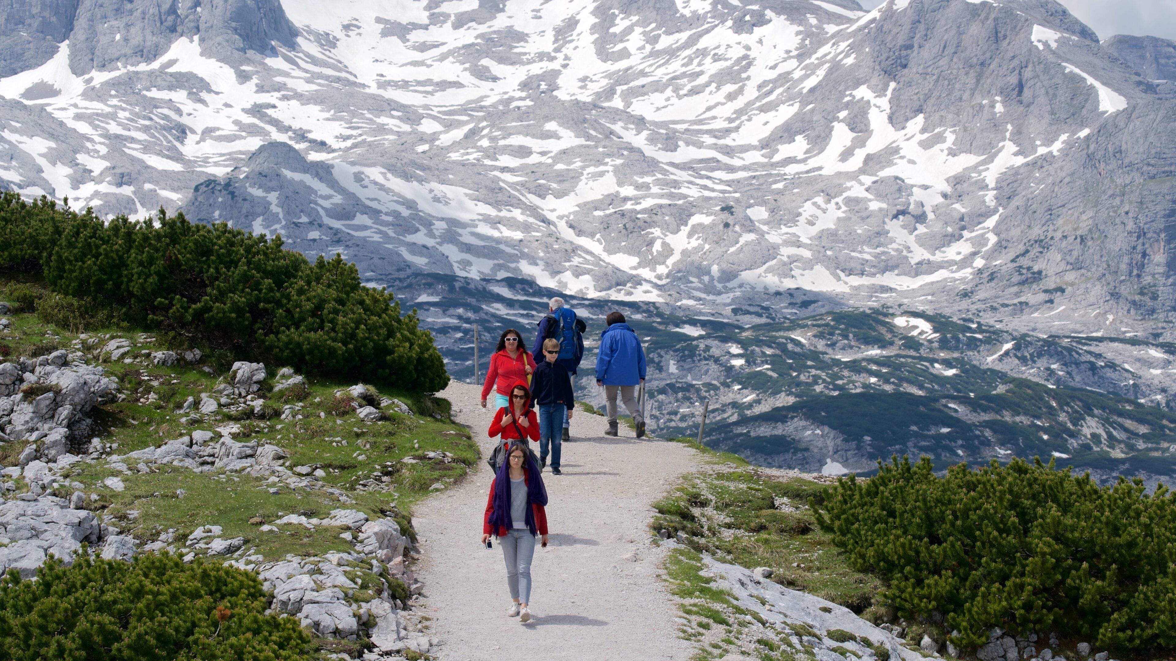 Hallstatt which includes hiking or walking, mountains and snow