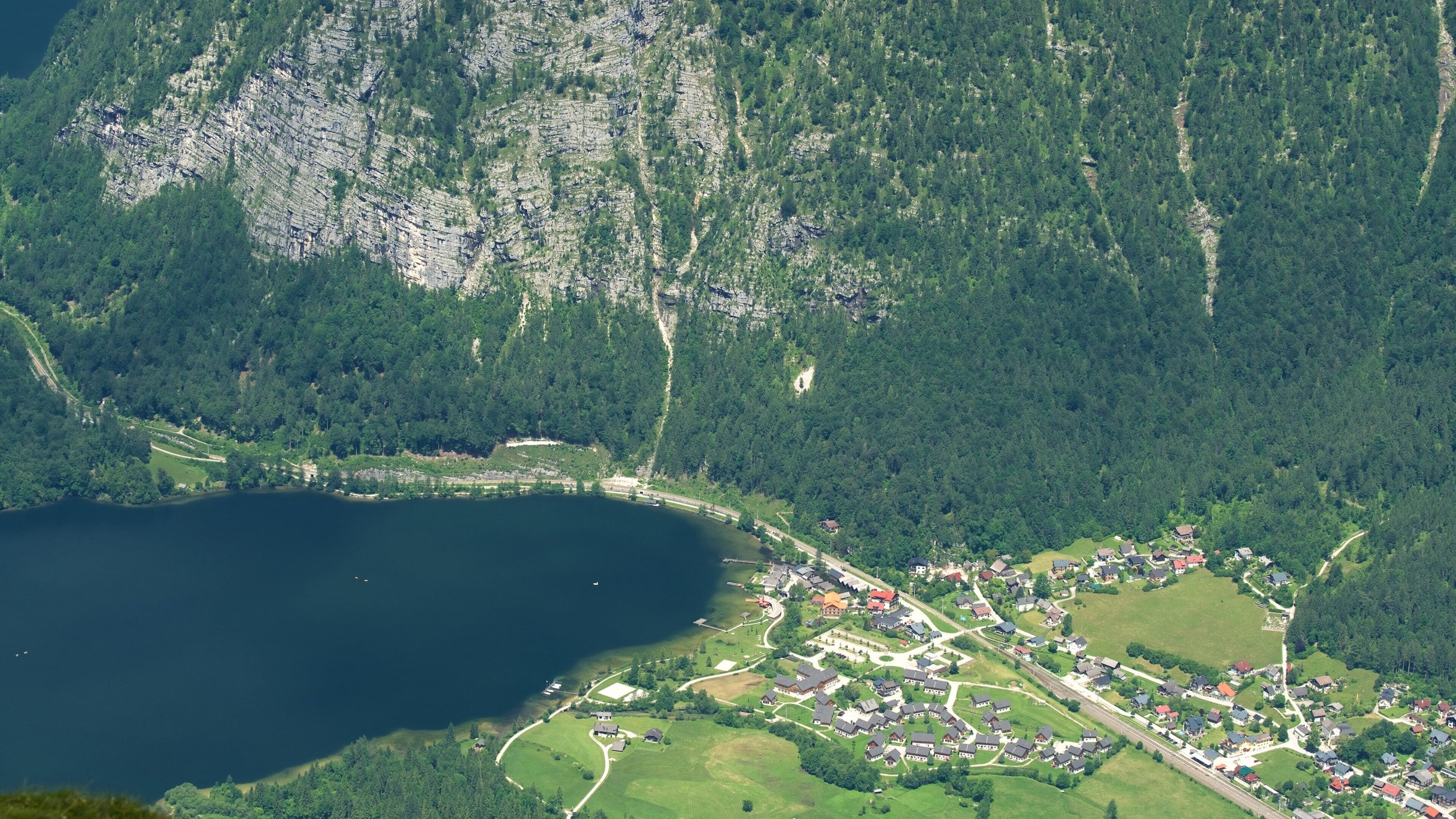 Dachstein Krippenstein featuring a lake or waterhole and a small town or village