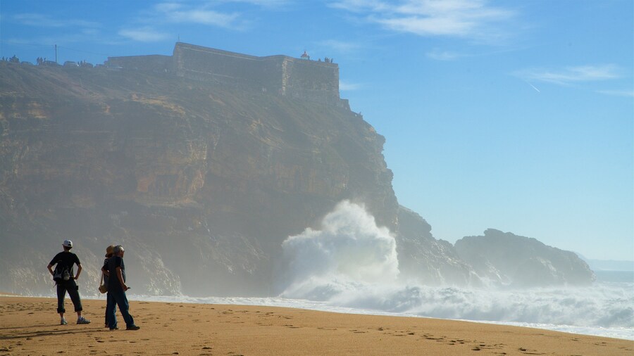 Norte Beach featuring rugged coastline, waves and a beach