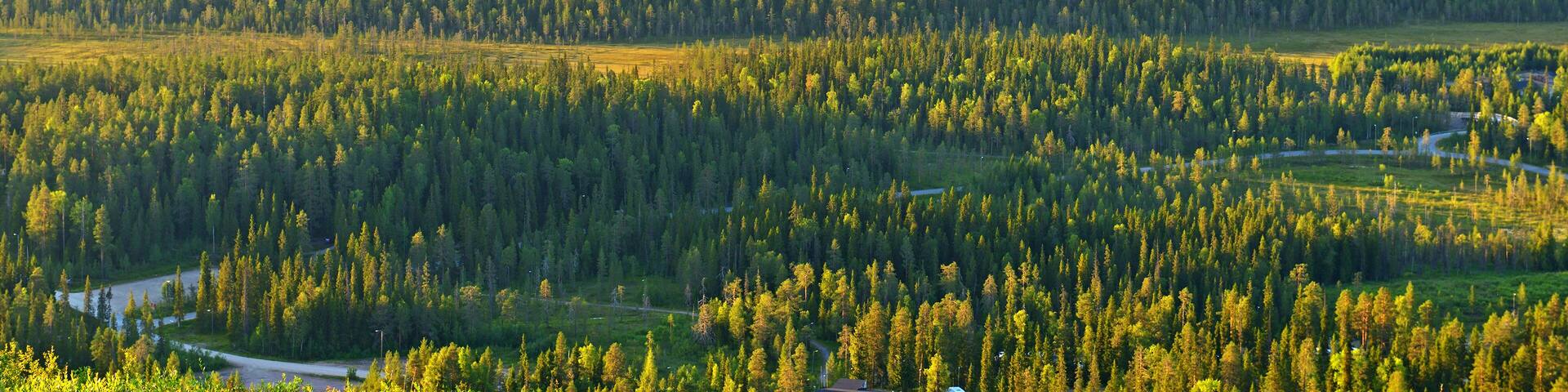 Northern hills in evening at sunset. Finland, Lapland