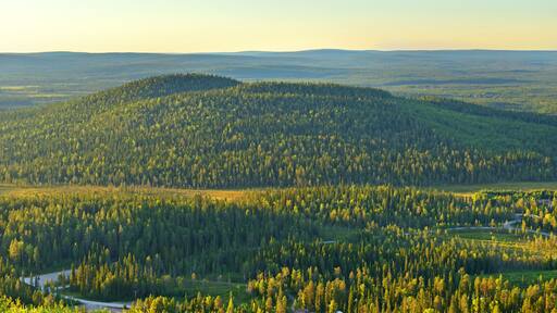 Northern hills in evening at sunset. Finland, Lapland