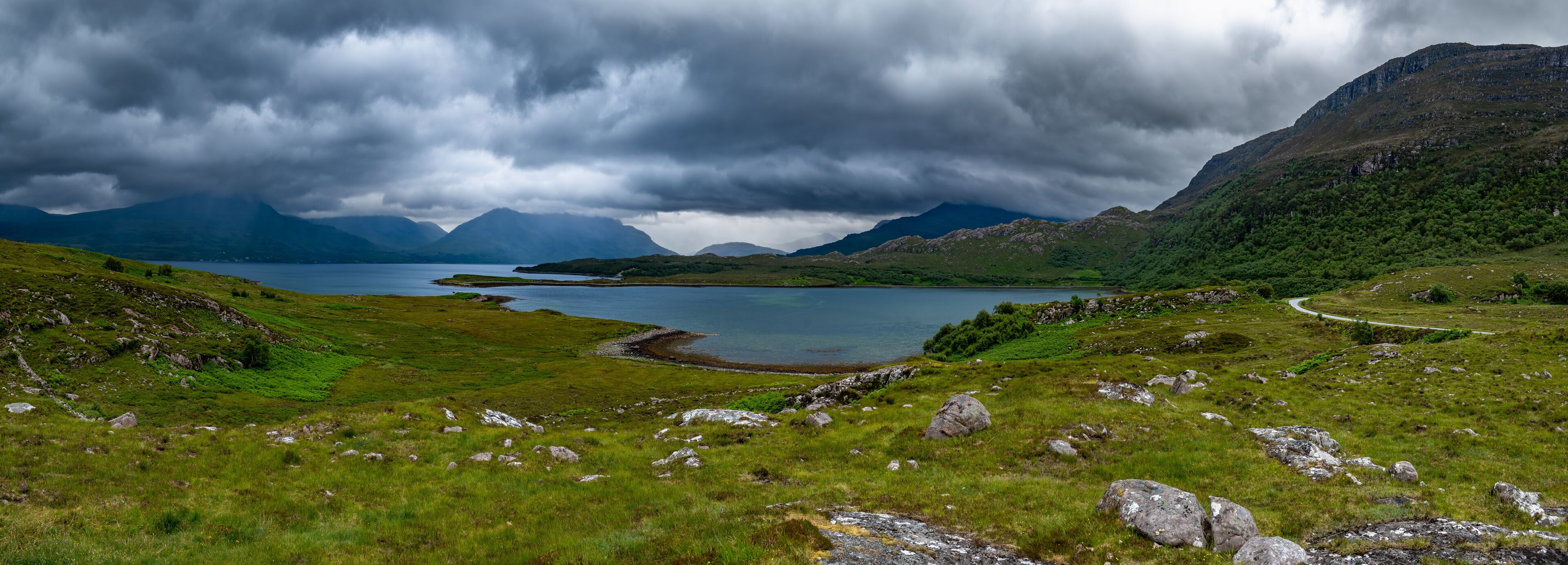 Picturesque Landscape With Mountains Beinn Alligin And Beinn Eighe near Village Shieldaig At The Atlantic Coast Of Loch Shieldaig In Scotland, UK