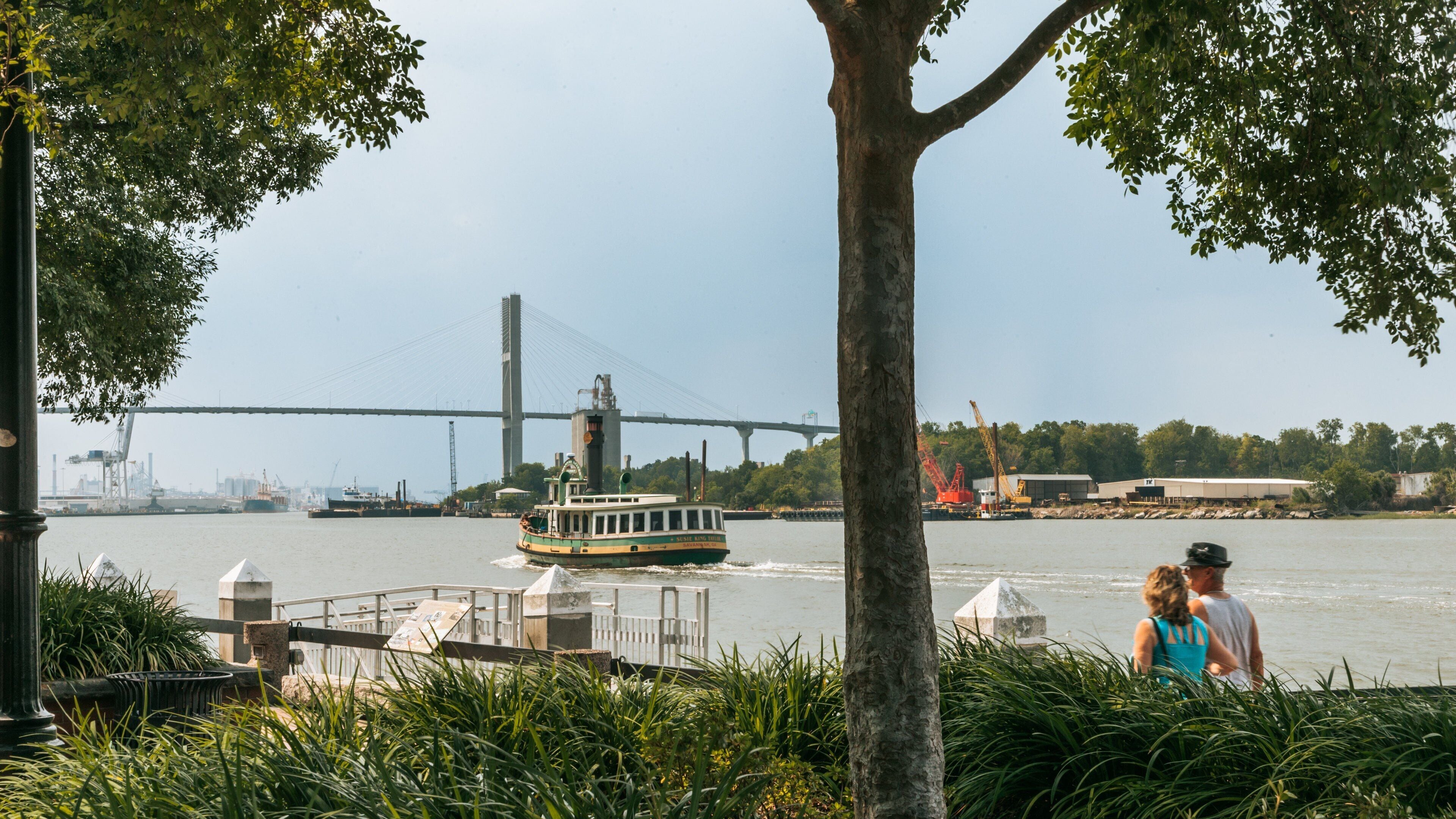 Rousakis Riverfront Plaza showing boating and a river or creek as well as a couple