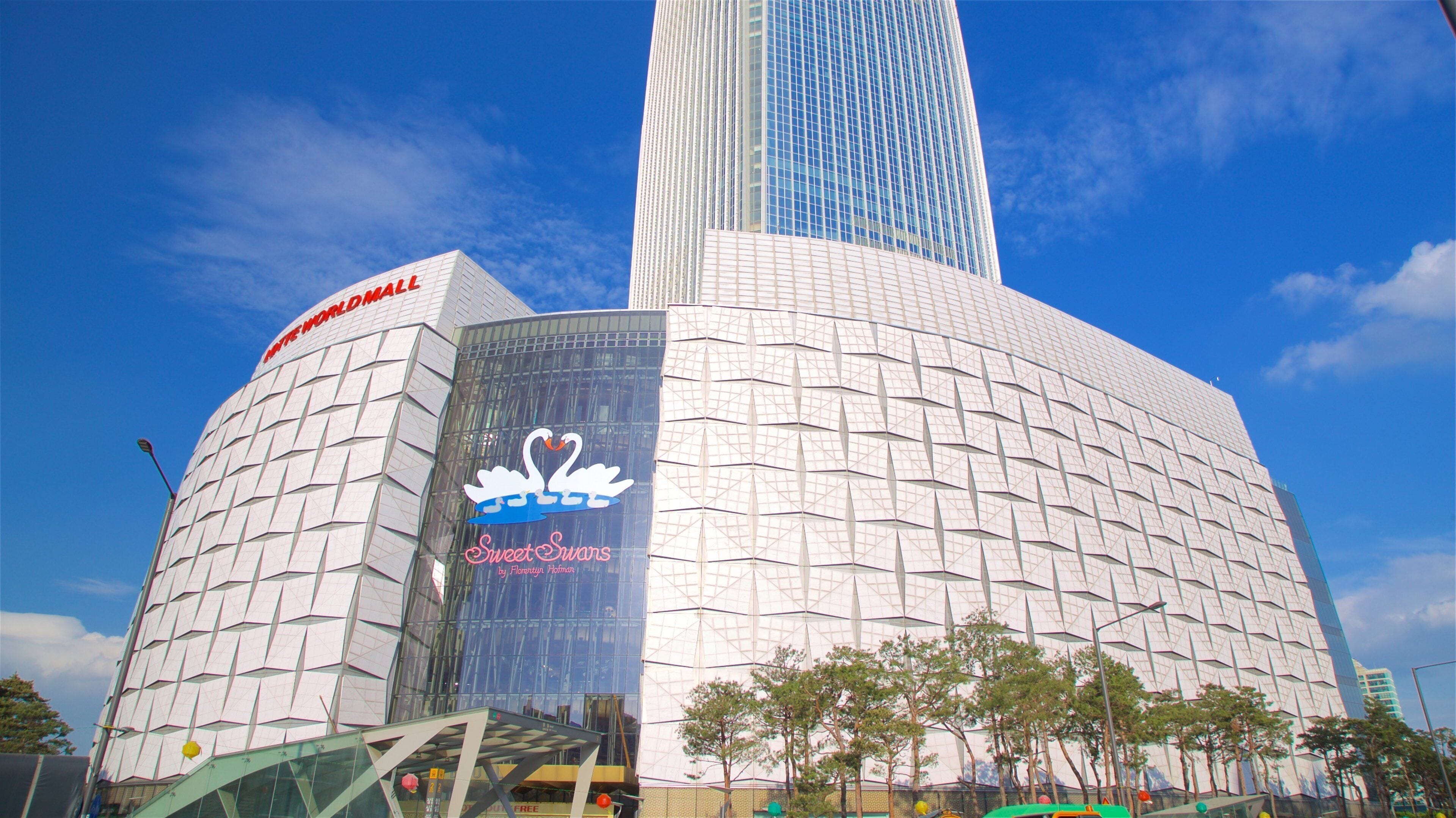 Lotte World Tower which includes modern architecture and signage