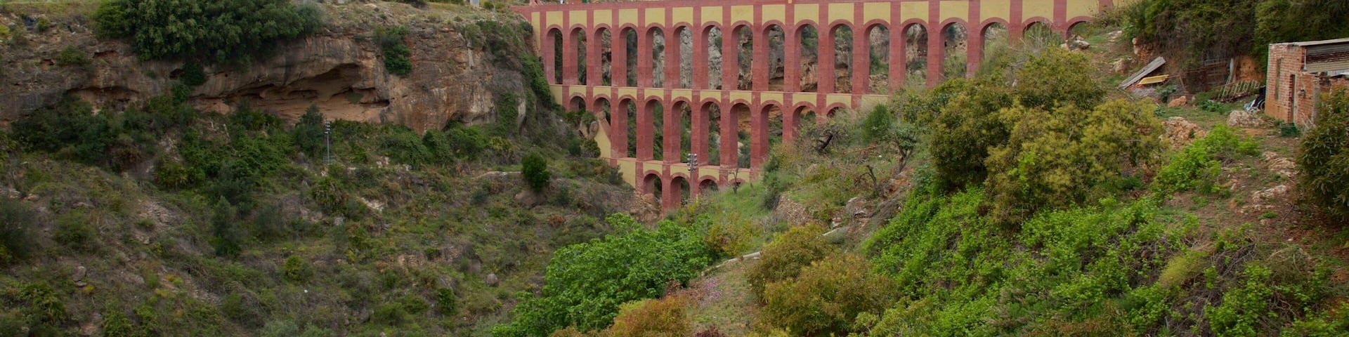 Nerja which includes a gorge or canyon and a bridge