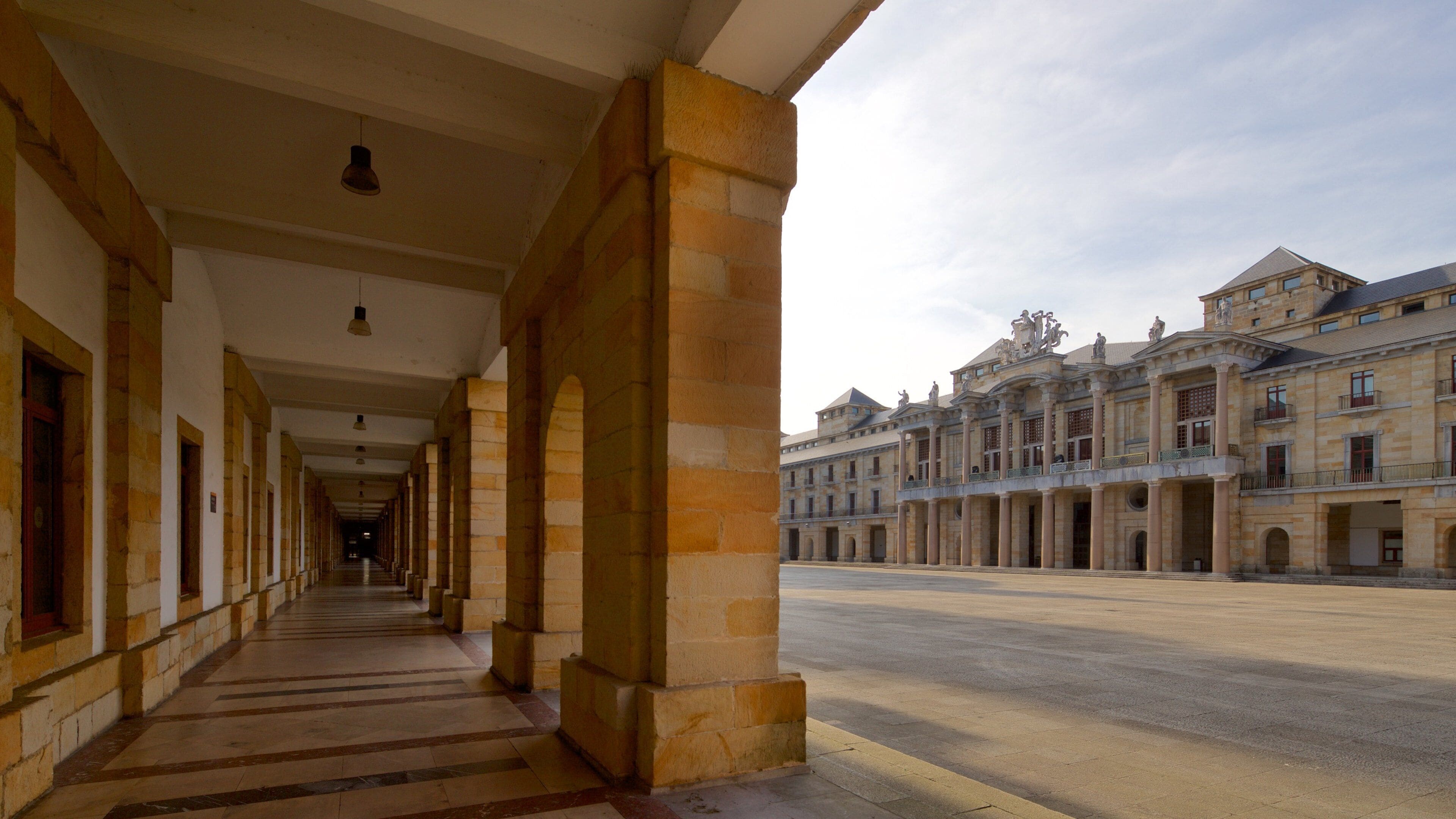 Laboral City of Culture showing heritage elements and a sunset