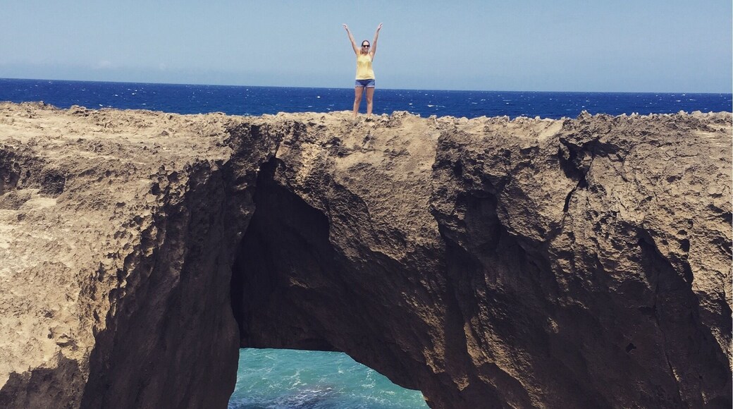 Playa Jobos in Puerto Rico had great $1 empanadas, lots of sun, and a really cool cliff!
