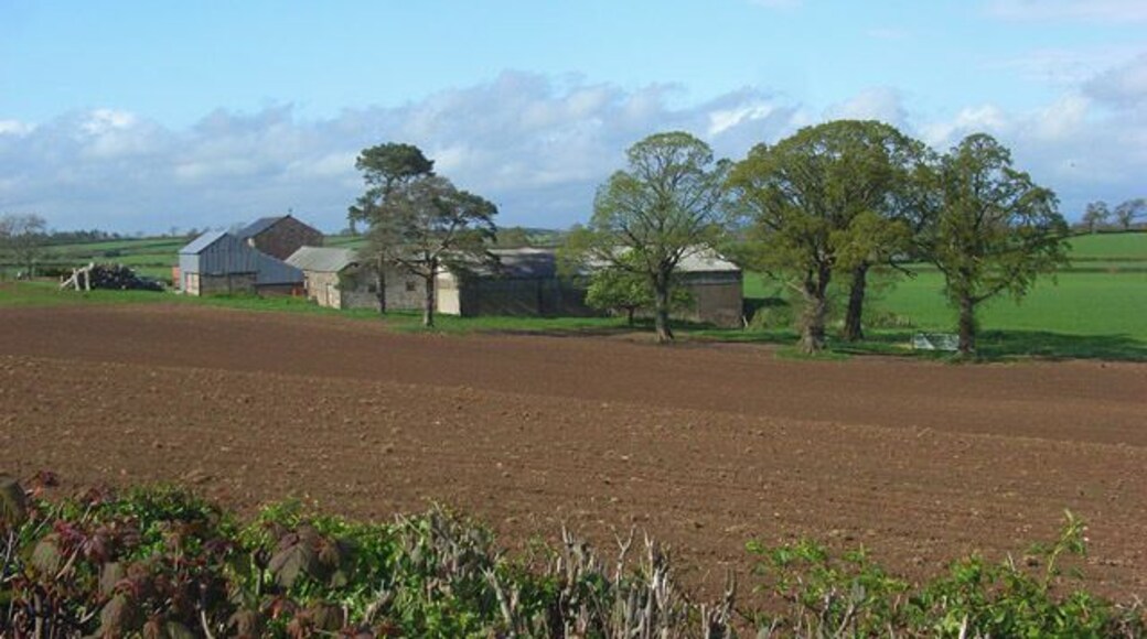 Lonning Head, Sebergham The view across a ploughed arable field from the B5305 which has climbed out of the Caldew valley.