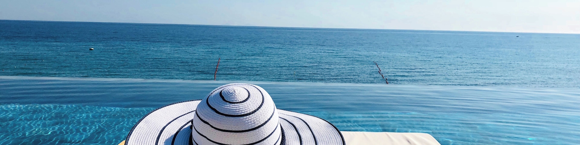 Revel in the turquoise water of Zakynthos – the spectacular sea view from Lesante Blu Exclusive Beach Resort’s infinity pool overlooking a small private beach #LifeAtExpedia #SeasideDiscoveries