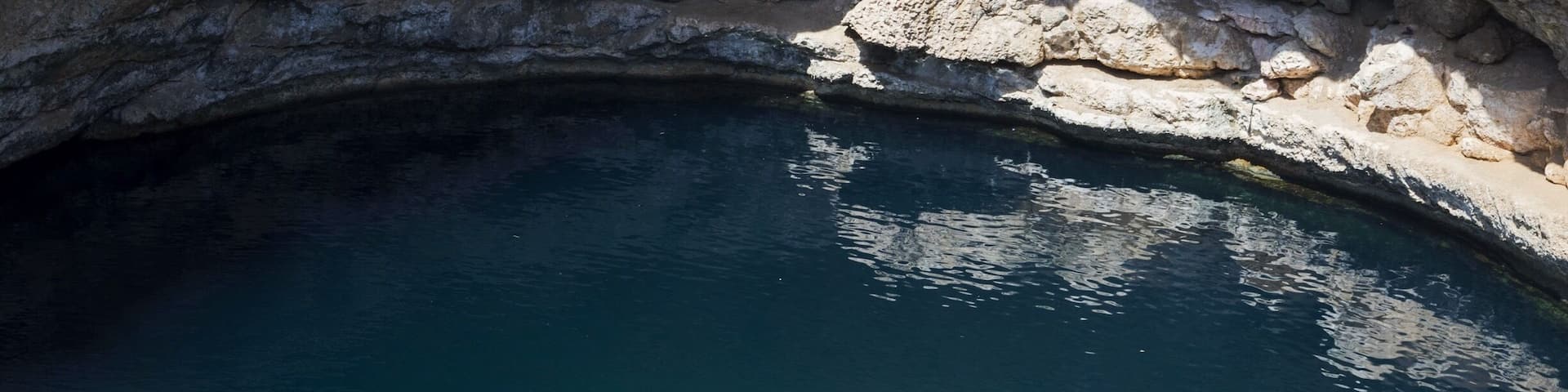 Not if but WHEN you go to Oman be sure to include the Bimmah sinkhole on your itinerary. This was the best swim of my life and I especially loved all the fishies nibbling my toes in the shallows, people pay money for that! Lol. Super deep, clear, blue and clean it's gorgeous!