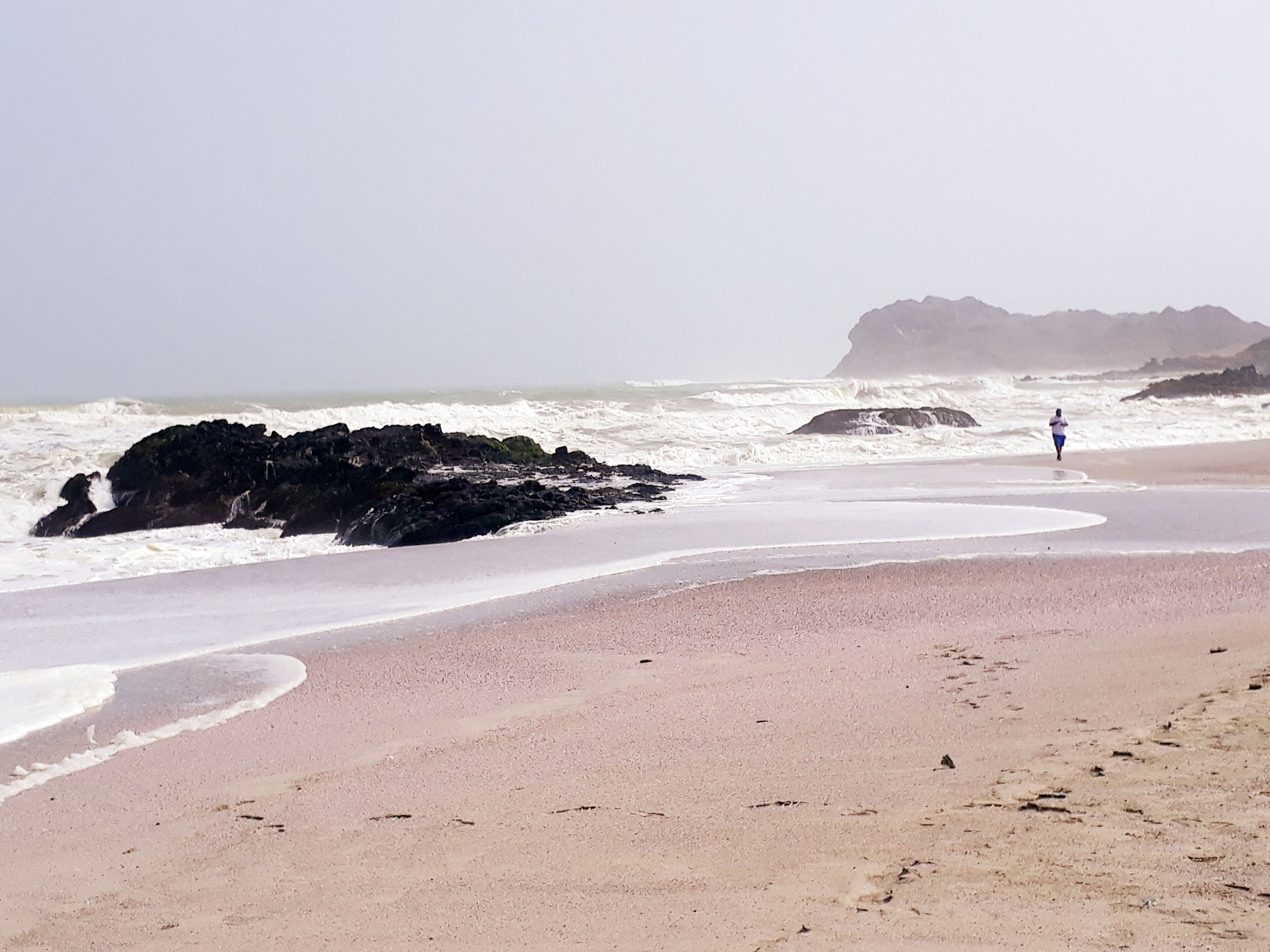 A serene Beach and a Lone Tourist....Enjoying the Breeze