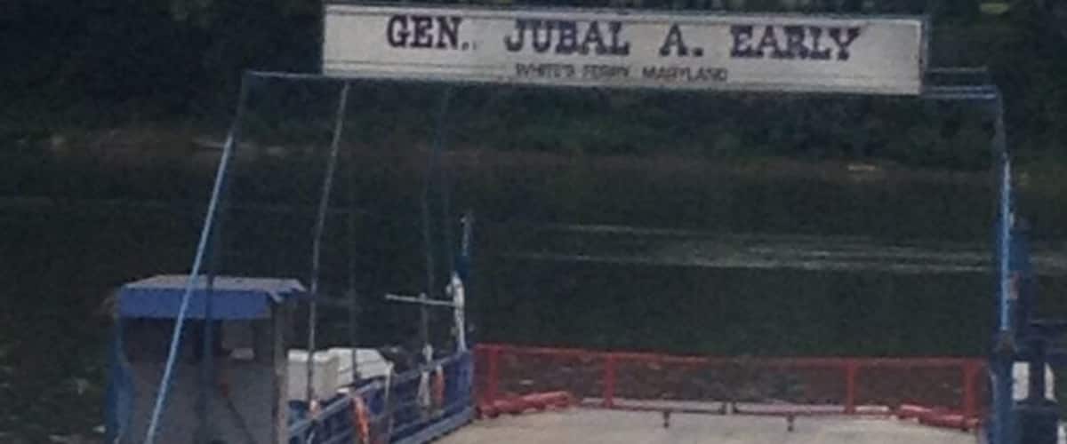 A dock with a sign reading "Gen. Jubal A. Early, Wheeling Ferry, Maryland."