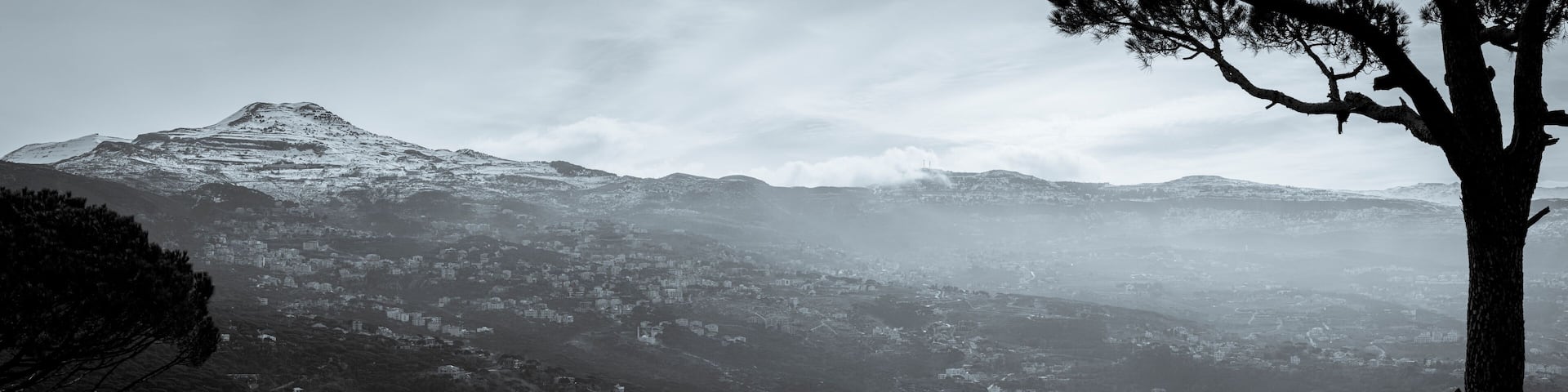 The mountains of Lebanon were once shaded by thick cedar forests and tree is the symbol of country. Beautiful landscape of mountainous town in winter, Eco tourism, Chouf district with large vistas