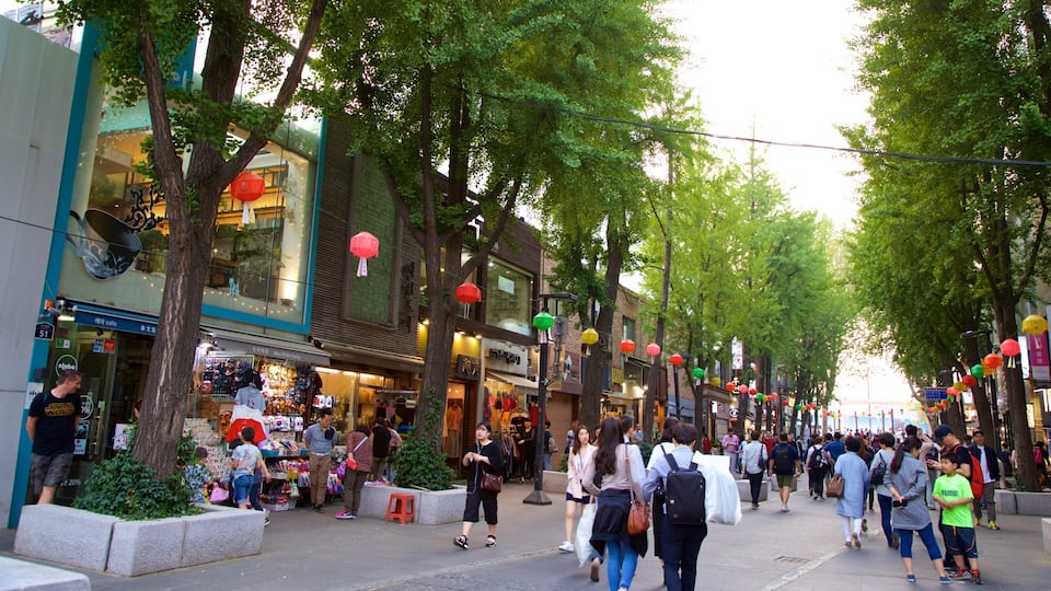 Insadong which includes shopping as well as a small group of people